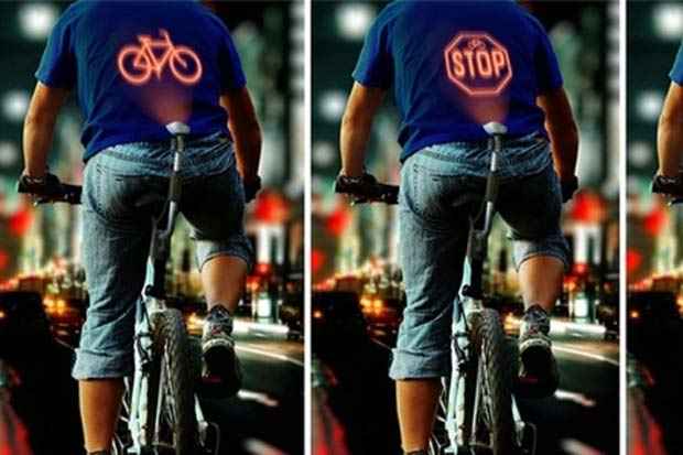 Dispositivo exibirá sinais luminosos nas costas dos ciclistas. Foto: behance.net/Reprodução Dispositivo exibirá sinais luminosos nas costas dos ciclistas. Foto: behance.net/Reprodução