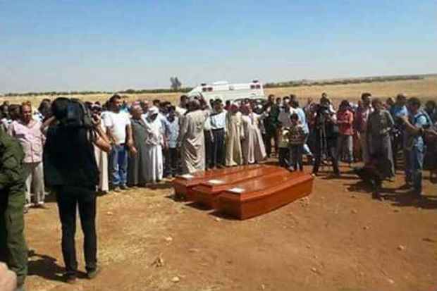 Cerimnia de enterro da famlia Kurdi. Foto:Stringer/ AFP 