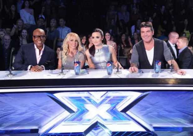 Segunda temporada da verso americana do reality teve o empresrio L.A. Reid, as cantoras Britney Spears e Demi Lovato, alm de Simon Cowell, criador do formato. Foto: The X Factor/Divulgao