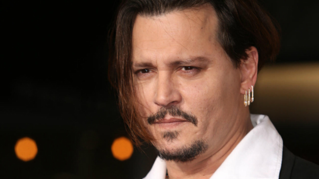 Johnny Depp foi acusado de violncia domstica pela ex-esposa, a atriz Amber Heard. Foto: THR/Reproduo