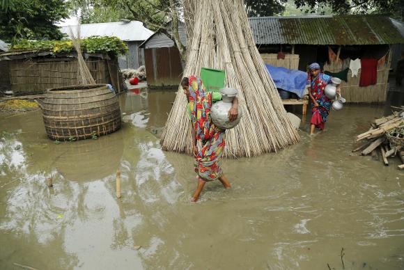 As inundaes j atingem 26 dos 64 distritos do pas e 470 mil pessoas tiveram que ser levadas para um dos 915 abrigos. Foto: ABIR ABDULLAH