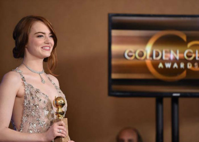 Emma Stone recebeu o prmio de melhor atriz em um musical ou comdia por seu papel em "La La Land" em 2017. Foto: AFP/Robyn Beck 