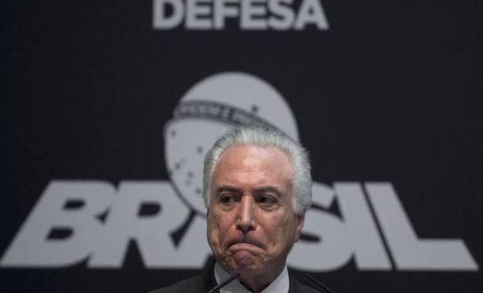 Temer escalou o porta-voz Alexandre Parola para rebater rumores sobre eventual candidatura. Foto: Mauro Pimentel/AFP