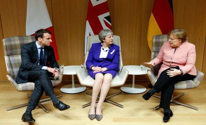 A primeira-ministra britnica Theresa May , a chanceler alem Angela Merkel e o presidente francs Emmanuel Macron
Foto: Francois Lenoir / AFP 