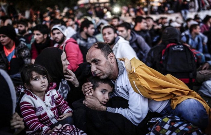 Retrao pode ser explicada pela adoo de maior rigor nas medidas de admisso de migrantes que pretendem permanecer no pas. Foto: Yasin Akgul/AFP