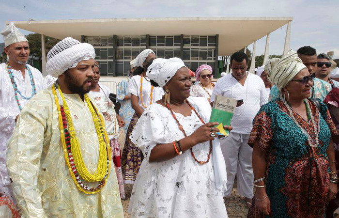 Praticantes de religies de matriz africana aguardam o incio do julgamento, no STF. Foto: Antonio Cruz/Agncia Brasil