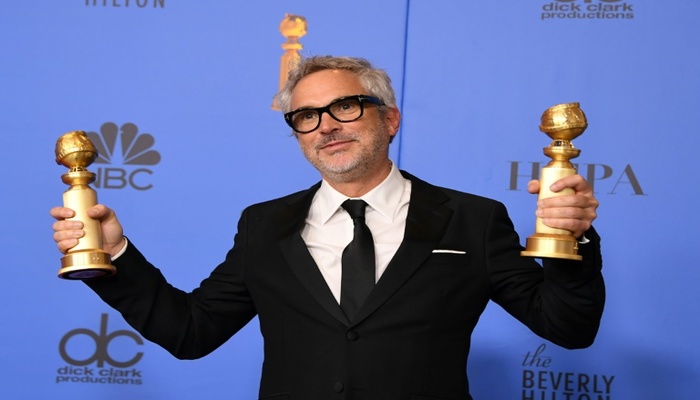 O mexicano Alfonso Cuarn conquistou dois Globos de Ouro com %u201CRoma%u201D. Foto: AFP Photo 
