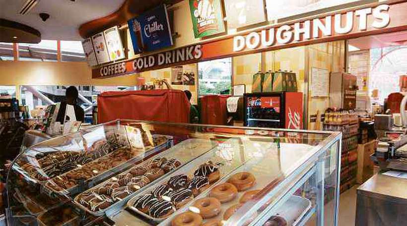 A Krispy Kreme Doughnuts, rede americana de rosquinhas, tambm integra o portflio da Jab Holdings. Foto: Nicholas Kamm/AFP
