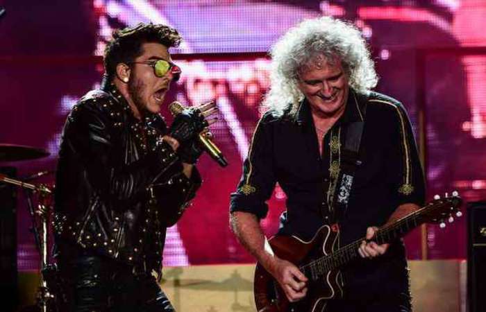 Adam Lambert e Queen tocando no Rock in Rio. Foto: AFP PHOTO/ CHRISTOPHE SIMON 