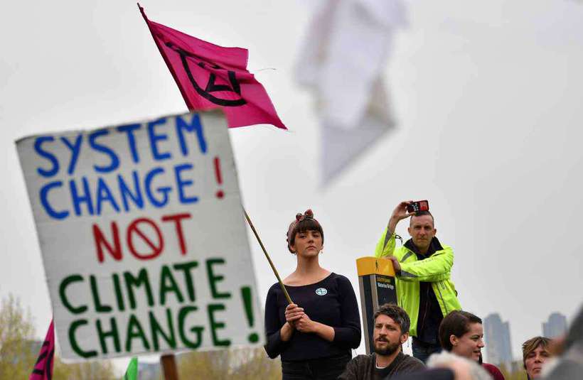 O movimento anunciou, dentro de sua 'rebelião internacional', protestos em 80 cidades de 30 países, até 22 de abril. Foto: BEN STANSALL / AFP