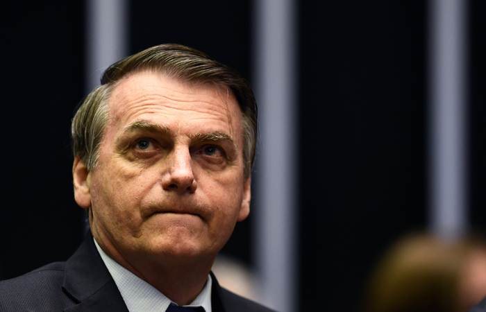 O presidente Jair Bolsonaro dever editar nesta quinta-feira ao menos oito atos normativos. Foto: Evaristo S/AFP (Foto: Evaristo S/AFP)
