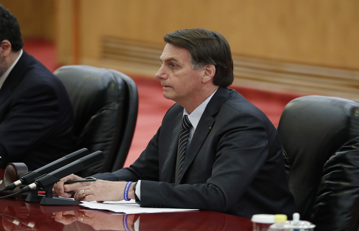 Bolsonaro retornou nesta quinta de uma viagem de 11 dias por países do Oriente. (Foto: Yukie Nishizawa/POOL/AFP
) Bolsonaro retornou nesta quinta de uma viagem de 11 dias por países do Oriente. (Foto: Yukie Nishizawa/POOL/AFP
)