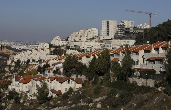 Atualmente, mais de 600.000 israelenses coexistem em conflito com cerca de trs milhes de palestinos.  (Foto: Menahem Kahana/AFP)