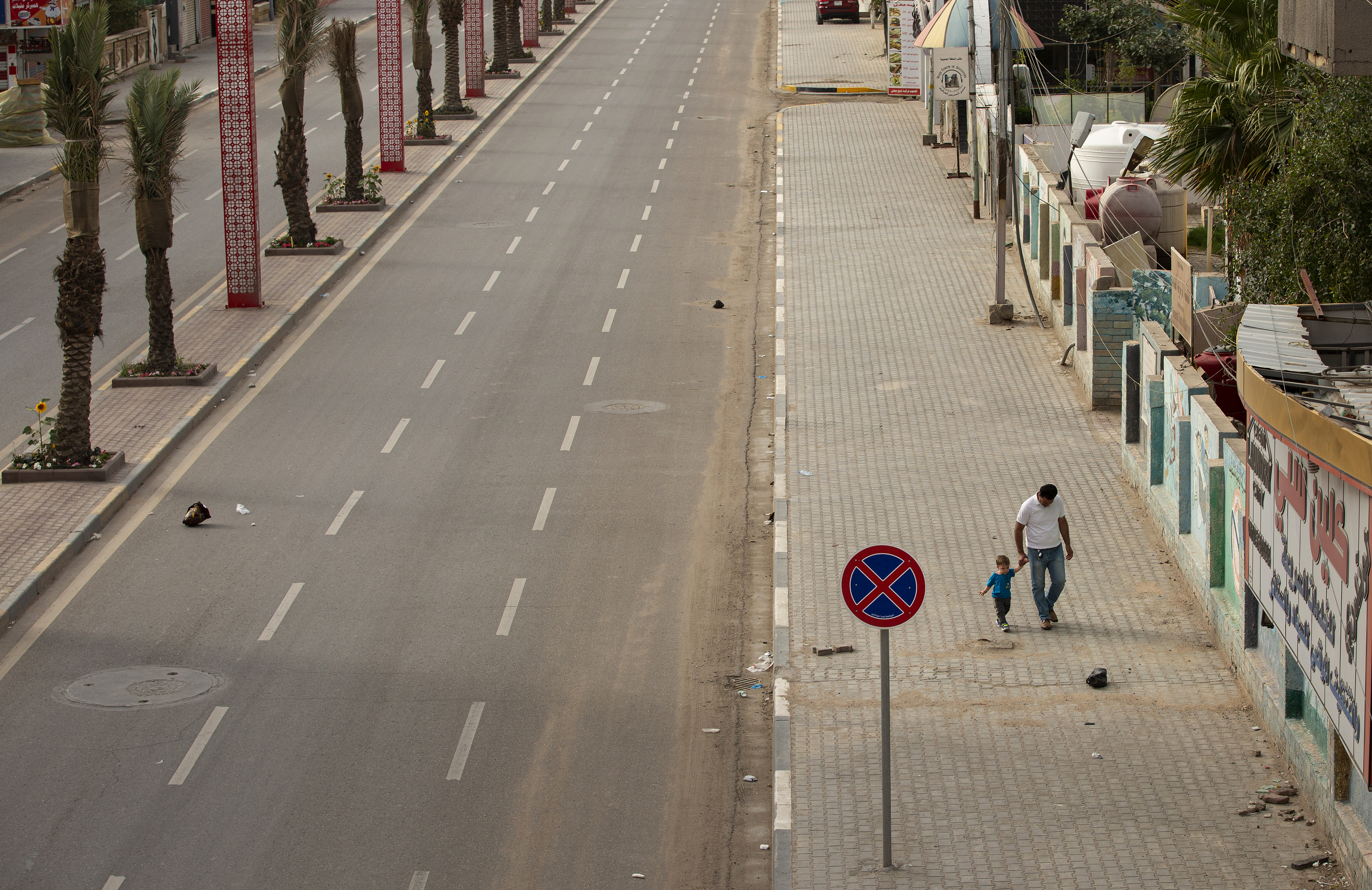  (Rua de Basra, no Iraque. Foto: Hussein Faleh / AFP
)