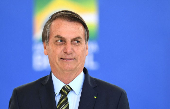 Mandatário, contudo, distorceu a fala da chanceler alemã, que relatou que o ato deveu-se ao pouco tempo de implementação das medidas restritivas
(Foto: Evaristo Sá/AFP) Mandatário, contudo, distorceu a fala da chanceler alemã, que relatou que o ato deveu-se ao pouco tempo de implementação das medidas restritivas
(Foto: Evaristo Sá/AFP)