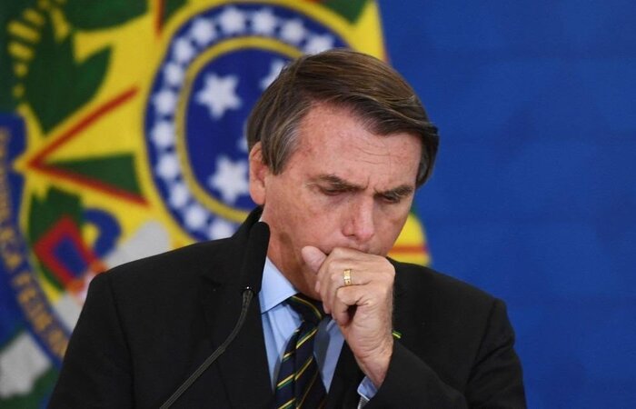 Presidente gravou vídeo ao lado do novo ministro da Defesa, Braga Netto, em uma entidade beneficente do Distrito Federal que faz distribuição de sopa para comunidades carentes (crédito: Evaristo Sá/AFP) Presidente gravou vídeo ao lado do novo ministro da Defesa, Braga Netto, em uma entidade beneficente do Distrito Federal que faz distribuição de sopa para comunidades carentes (crédito: Evaristo Sá/AFP)
