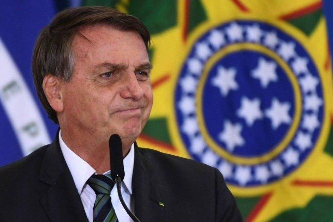 Com a instalação da comissão, na próxima terça-feira, Bolsonaro entra em campo para tentar evitar desgastes ao governo
 (Foto: AFP)