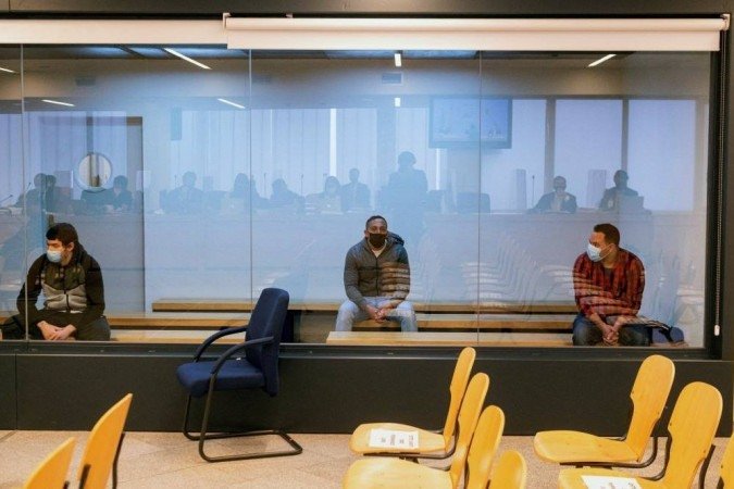 (Mohamed Houli Chemlal e Driss Oukabir, julgados por pertencerem a esta célula, foram condenados a 53 anos e meio e 46 anos, respectivamente, enquanto o Ministério Público havia solicitado 41 e 36 anos contra eles. Foto: FERNANDO VILLAR / POOL / AFP) (Mohamed Houli Chemlal e Driss Oukabir, julgados por pertencerem a esta célula, foram condenados a 53 anos e meio e 46 anos, respectivamente, enquanto o Ministério Público havia solicitado 41 e 36 anos contra eles. Foto: FERNANDO VILLAR / POOL / AFP)