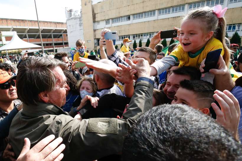 (De acordo com o governo do estado, o presidente promoveu aglomeração de mais de 100 pessoas 'sem controle sanitário e sem uso de máscara'. Foto: Alan Santos/PR) (De acordo com o governo do estado, o presidente promoveu aglomeração de mais de 100 pessoas 'sem controle sanitário e sem uso de máscara'. Foto: Alan Santos/PR)