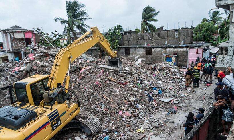 Itamaraty reconhece o débito, mas diz que repasses estão sendo preparados; mineiros formaram comitiva para atuar após terremoto
(Foto: Reginald LouissaInt Jr / AFP ) Itamaraty reconhece o débito, mas diz que repasses estão sendo preparados; mineiros formaram comitiva para atuar após terremoto
(Foto: Reginald LouissaInt Jr / AFP )